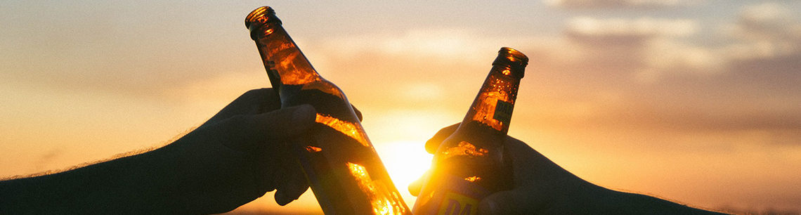 beer bottles at sunset