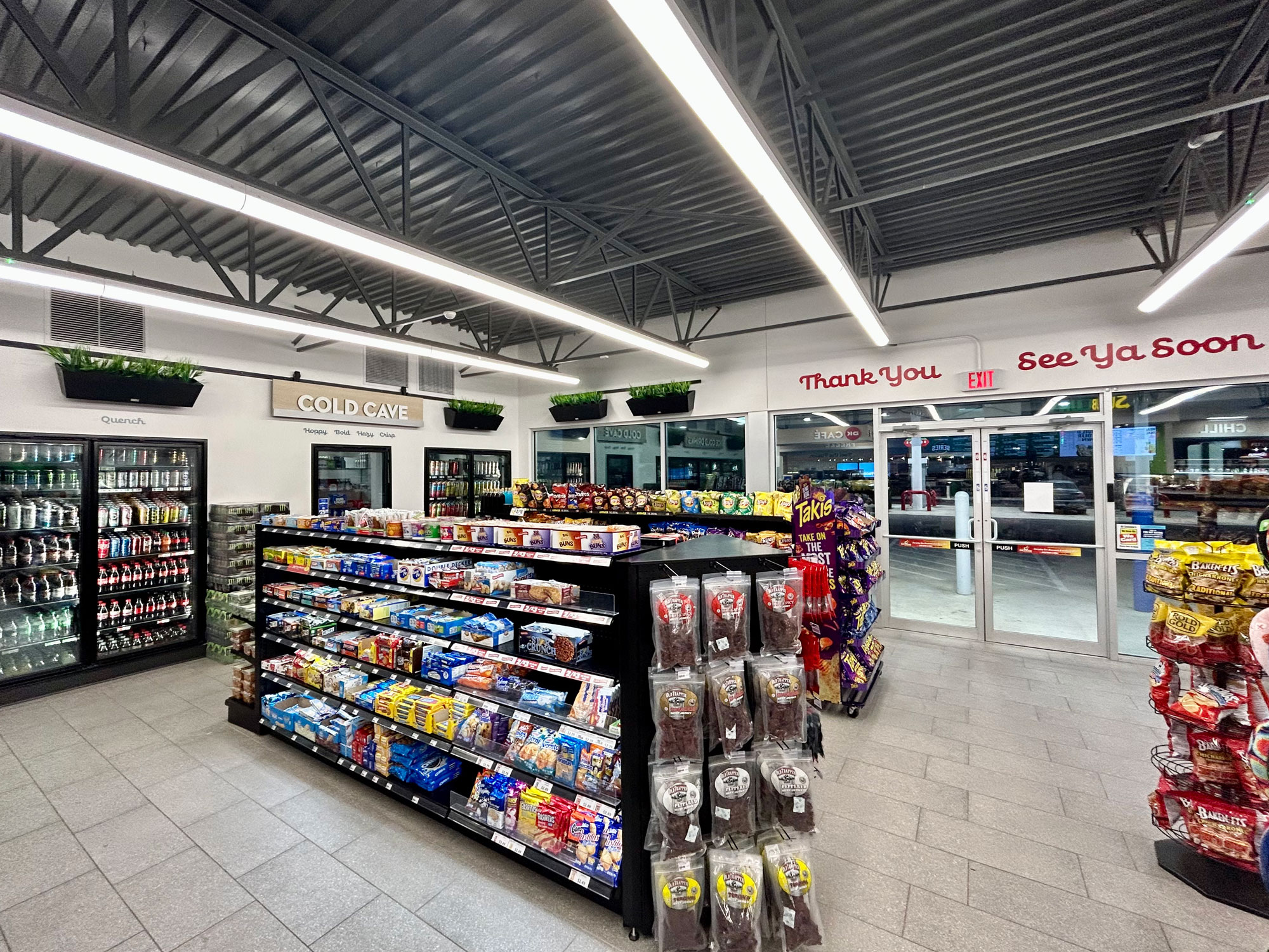 Delek store interior updated branding and décor