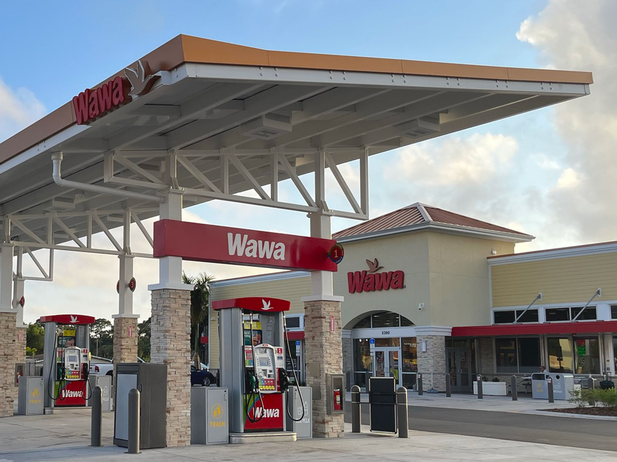 Wawa forecourt and storefront