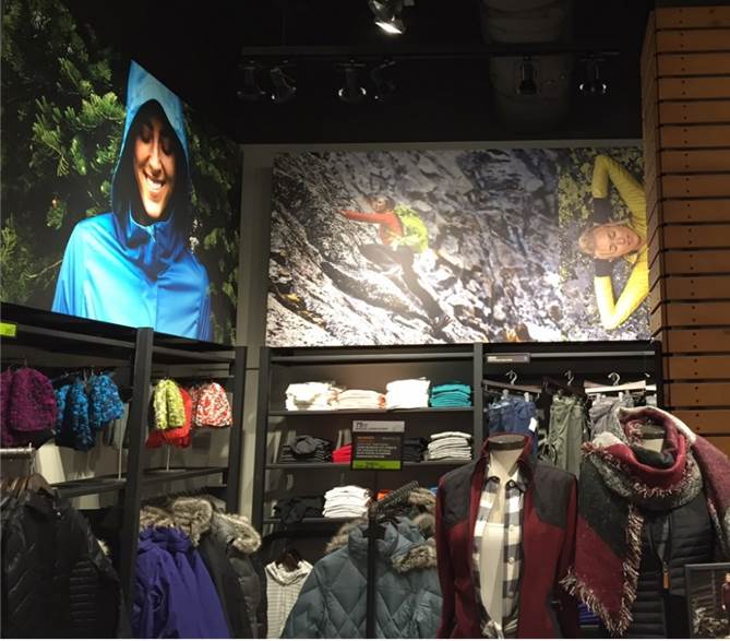 outdoor clothing store interior versatile fixtures