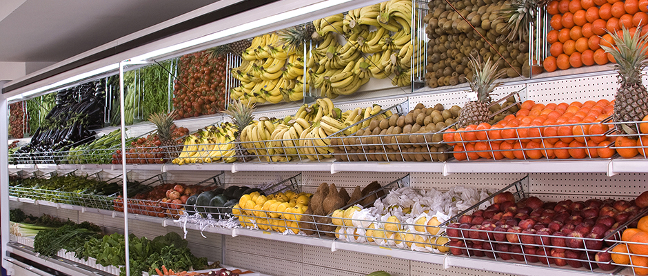 produce department with fruits and vegetables